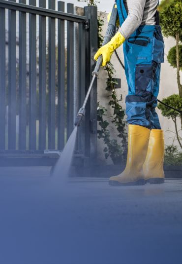 Cleaner wiping kitchen bench during bond clean
